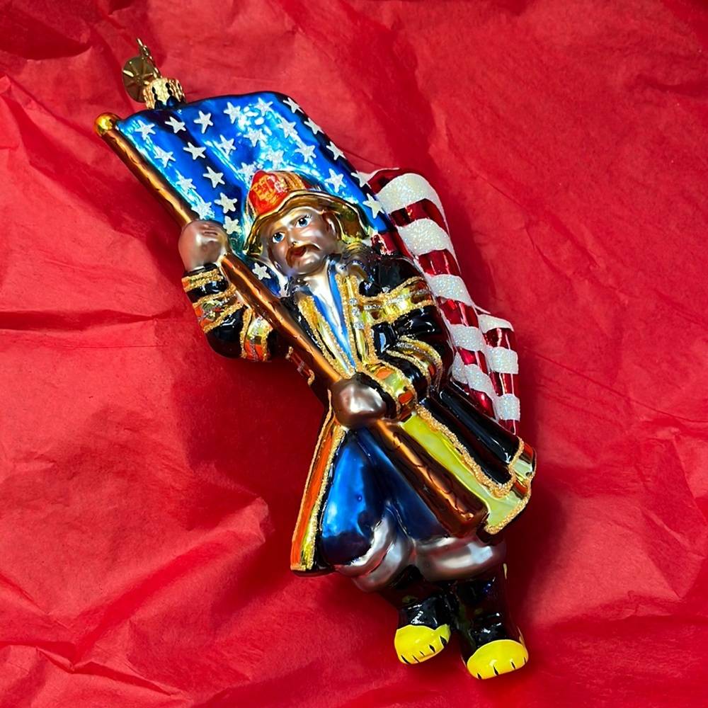 Christopher Radko  AMERICA'S BRAVEST- FIREMAN - RETIRED ORNAMENT